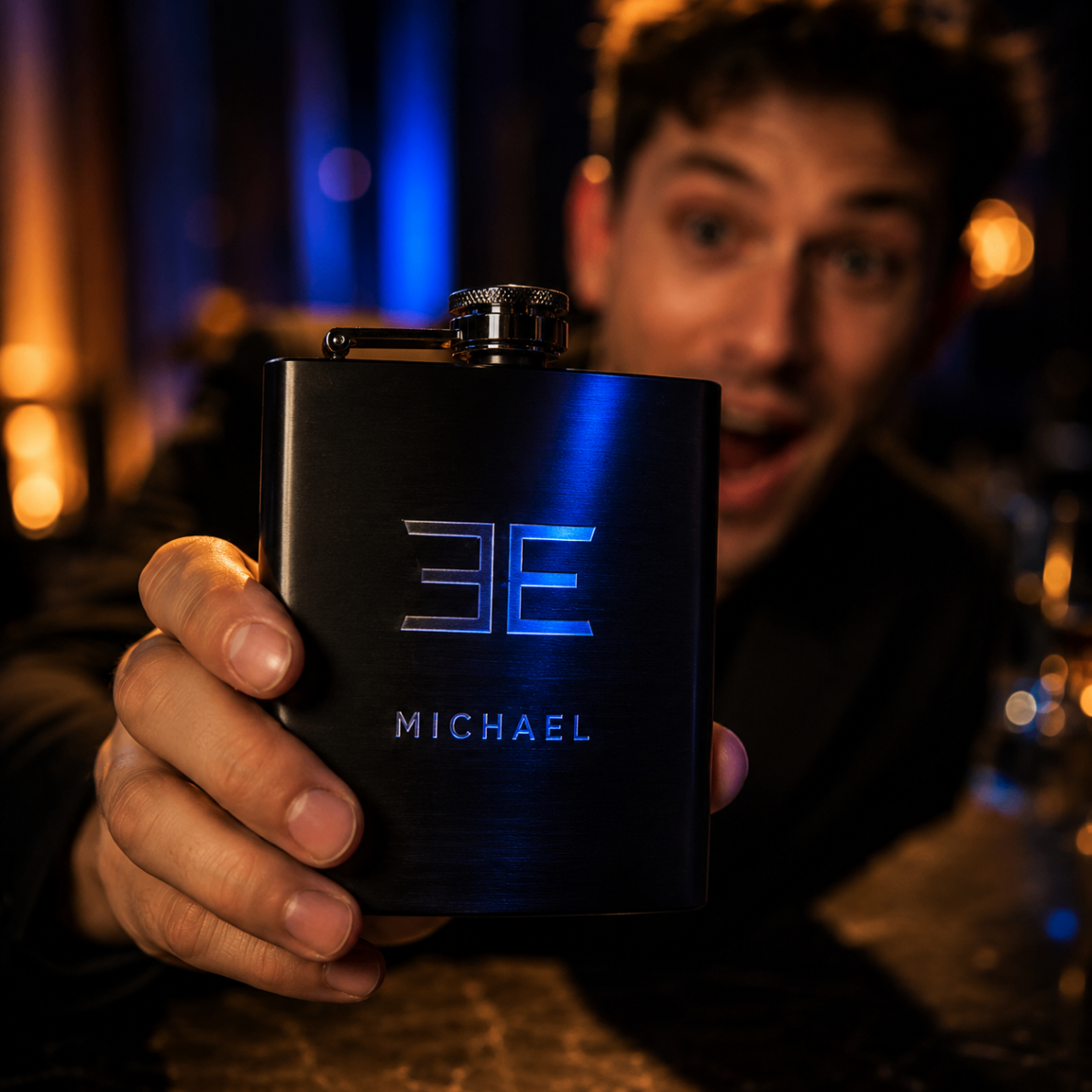 Guest holding an engraved flask with a surprised reaction
